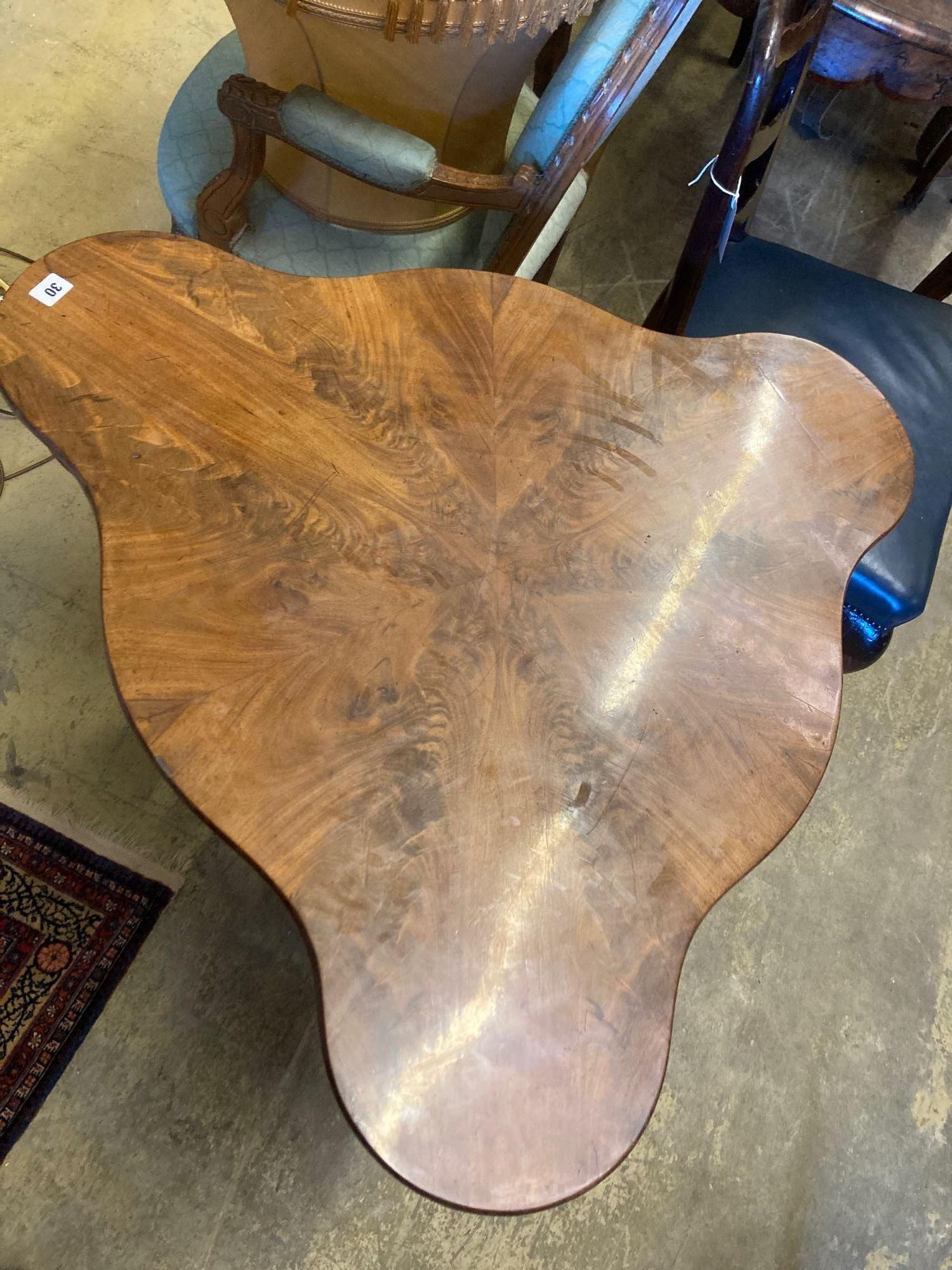 A Continental mahogany trefoil corner table, width 88cm